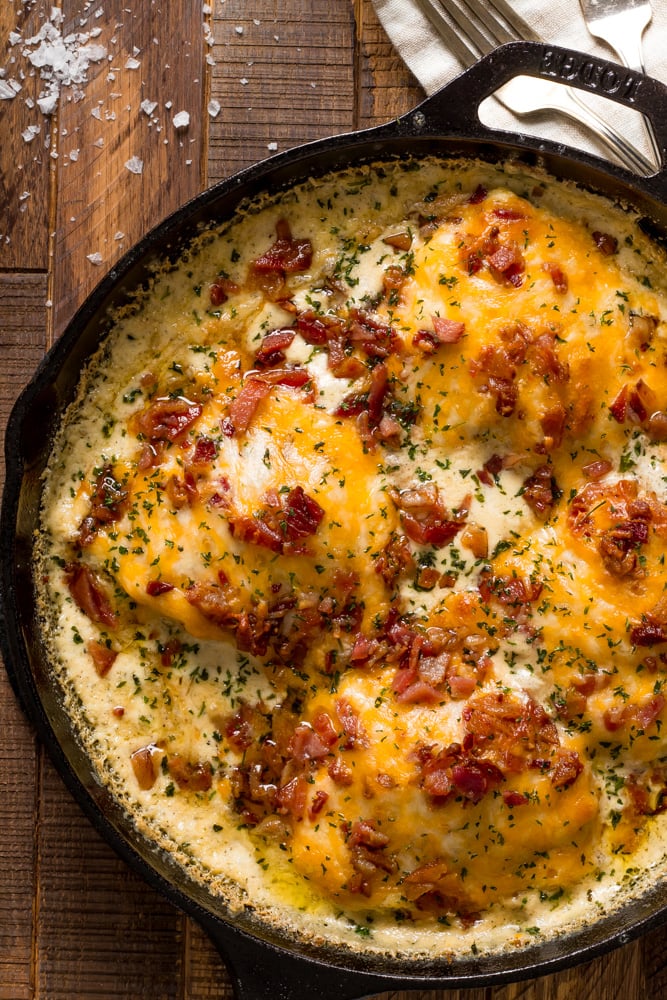 crack chicken thighs in a skillet