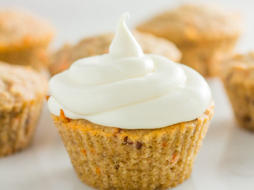 Keto cream cheese frosting on a carrot cake keto cupcake