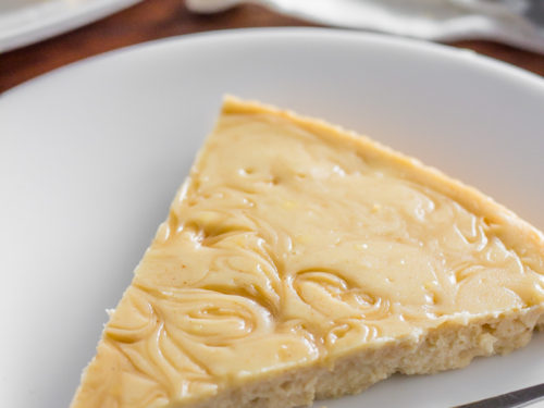 maple keto cheesecake with fork on plate