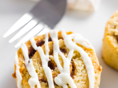 Keto cinnamon rolls with icing on plate