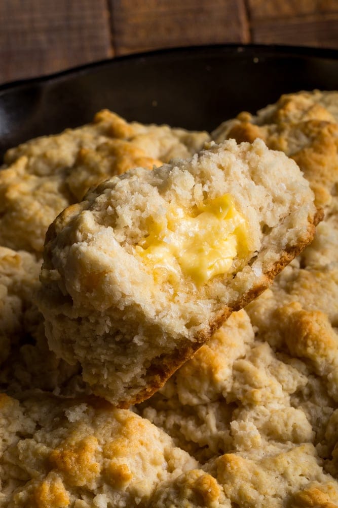 cathead biscuit split with butter and flaky sea salt