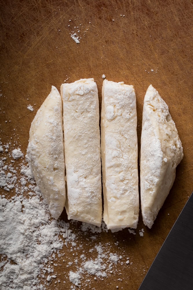 canned biscuits cut into four strips for chicken and dumplings