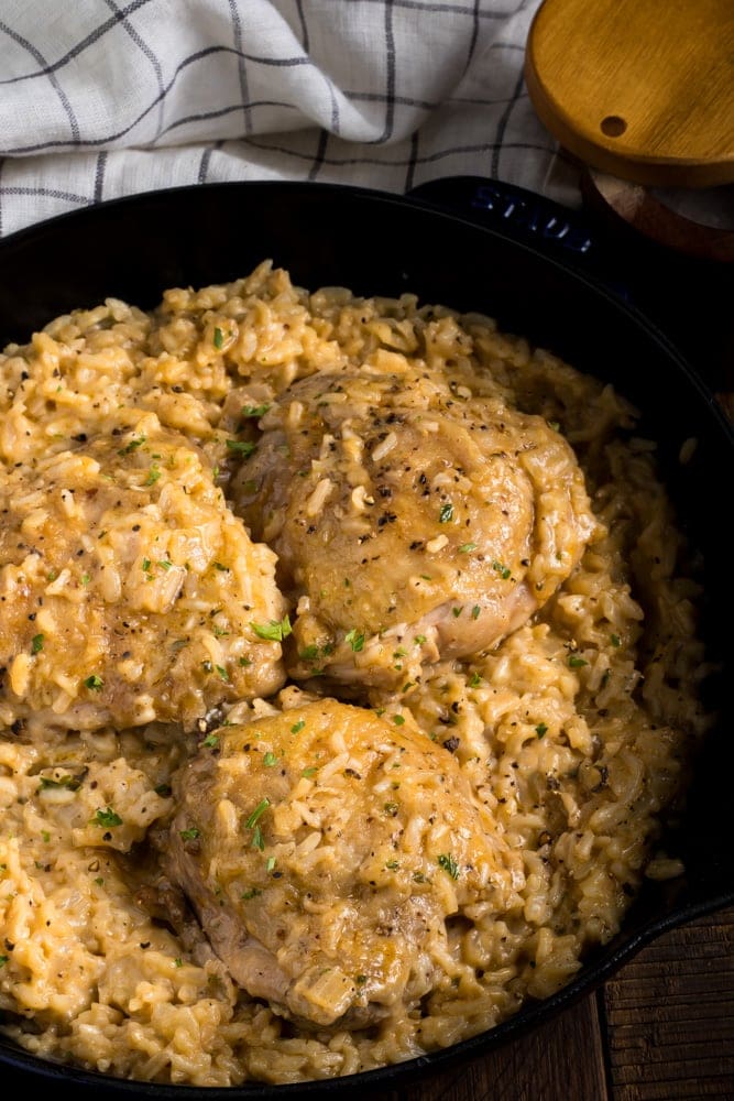 smothered chicken and rice in pan
